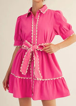 Hot pink babydoll dress with scallop trim accents